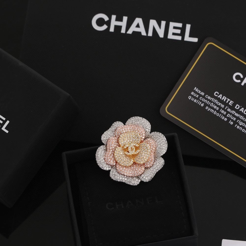 Ch**el brooches